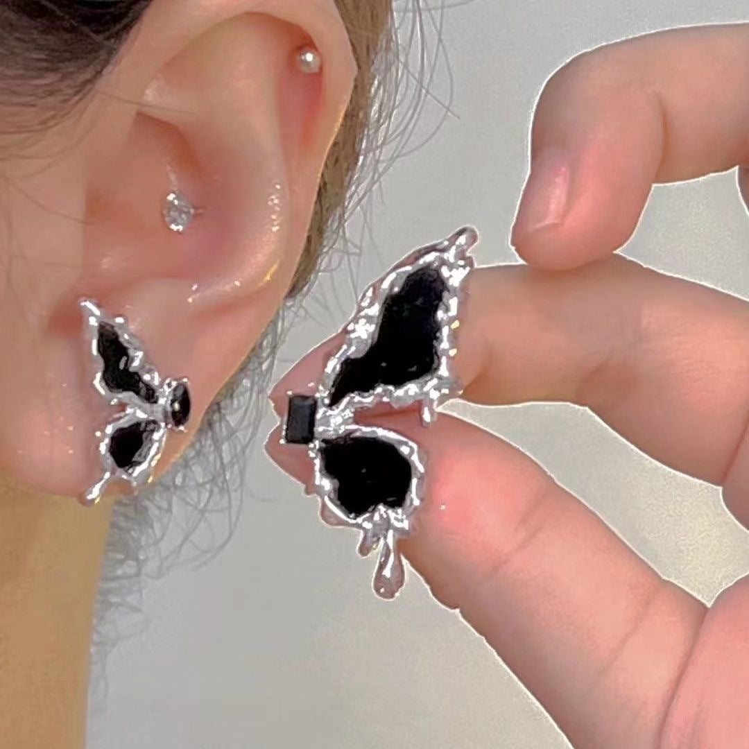 asymmetric butterfly earrings