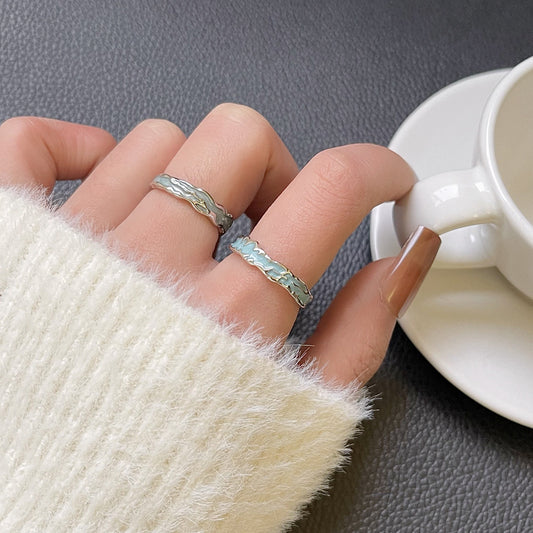 Pale blue irregular ring